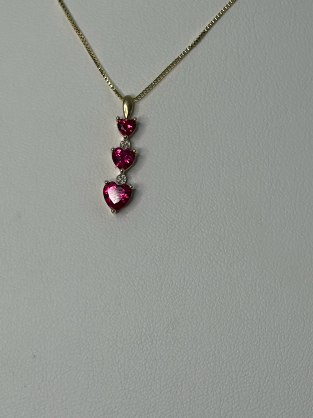 10K yellow gold and 3 Ruby pendant and sterling silver chain